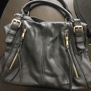 Black bag with gold detail, tons of room